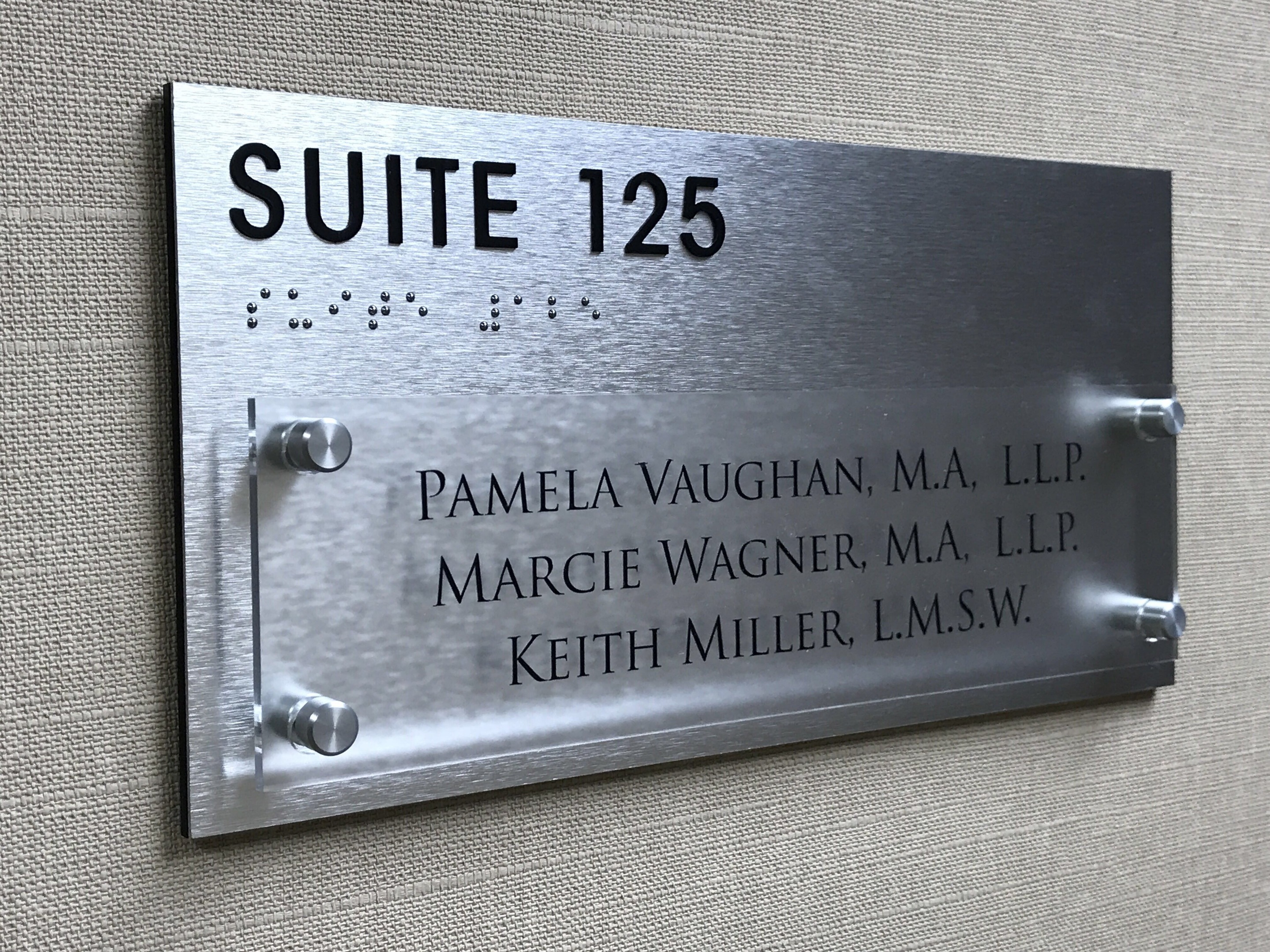 BRT PROPERTIES " suite 125" Stand off glass panels with names