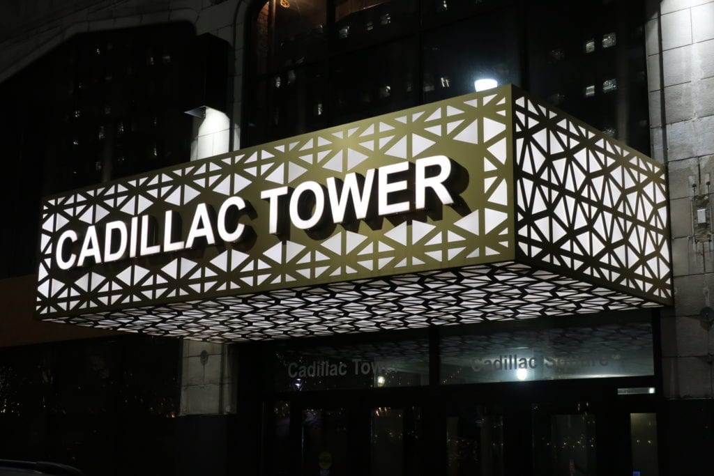 CADILLAC TOWER DIMENSIONAL CHANNEL LETTERS GOLD, BLACK AND WHITE