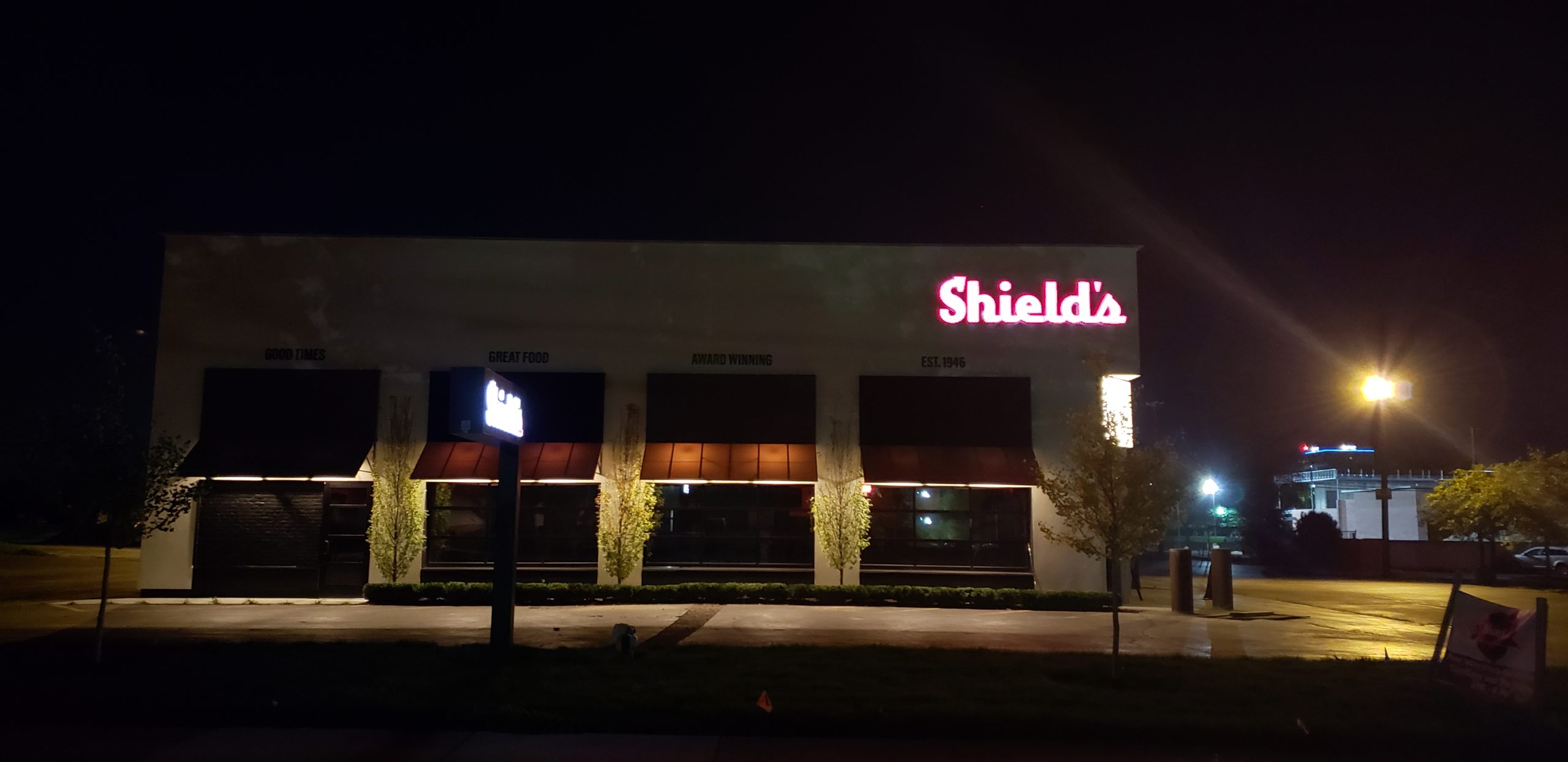 Shield's channel letter illuminated building sign in red