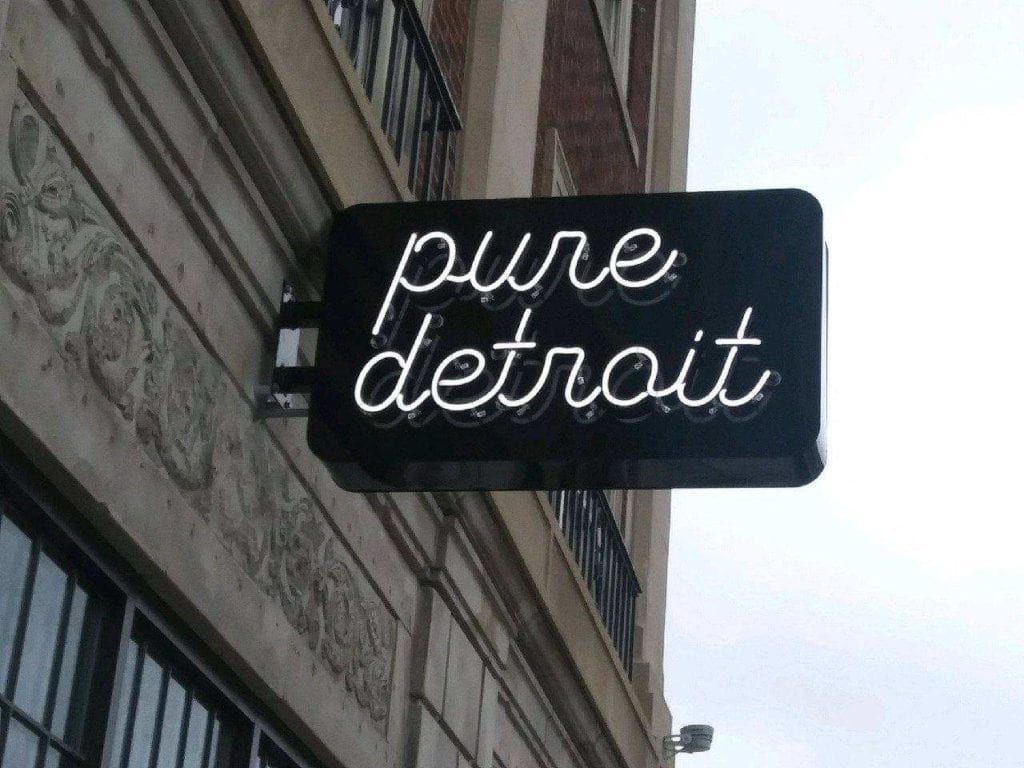 Pure Detroit Neon Blade Sign, black sign with white neon