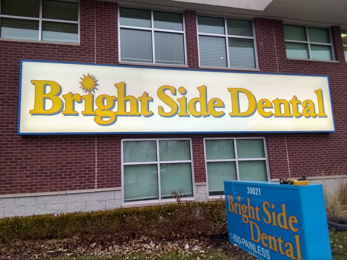exterior wall sign cabinet face box signage Bright Side Dental illuminating detroit dentist