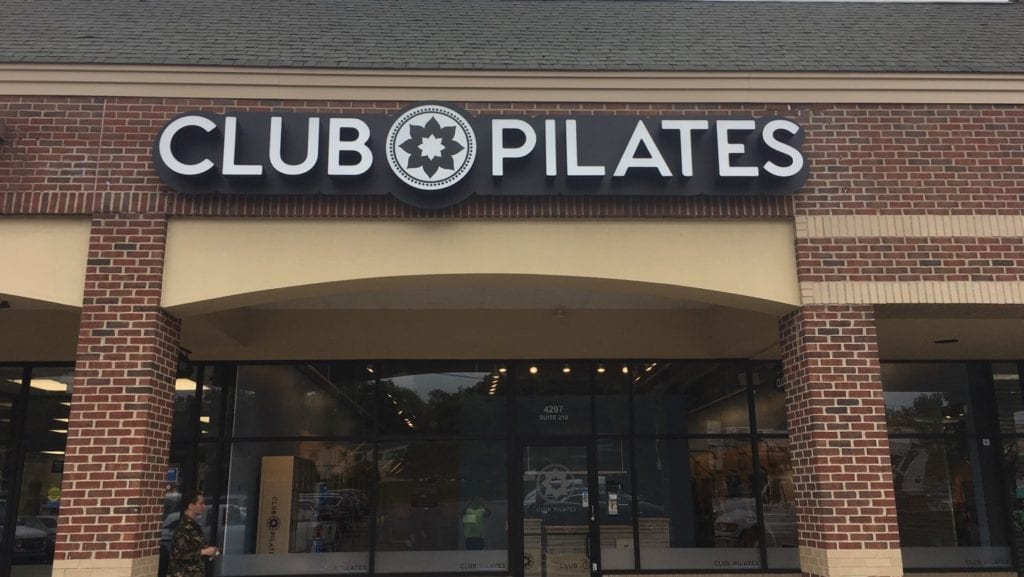 CHANNEL LETTERS MOUNTED ON RACEWAY FOR CLUB PILATES
