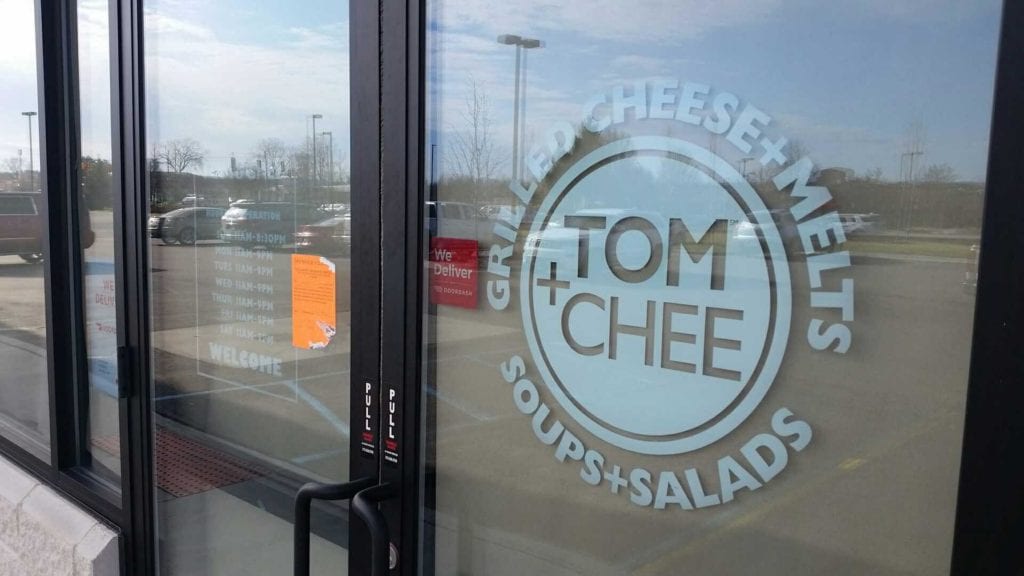 Tom + Chee window logo wall vinyl graphics white