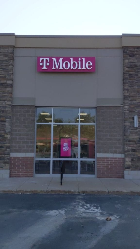 PINK AND WHITE TMOBILE SIGN