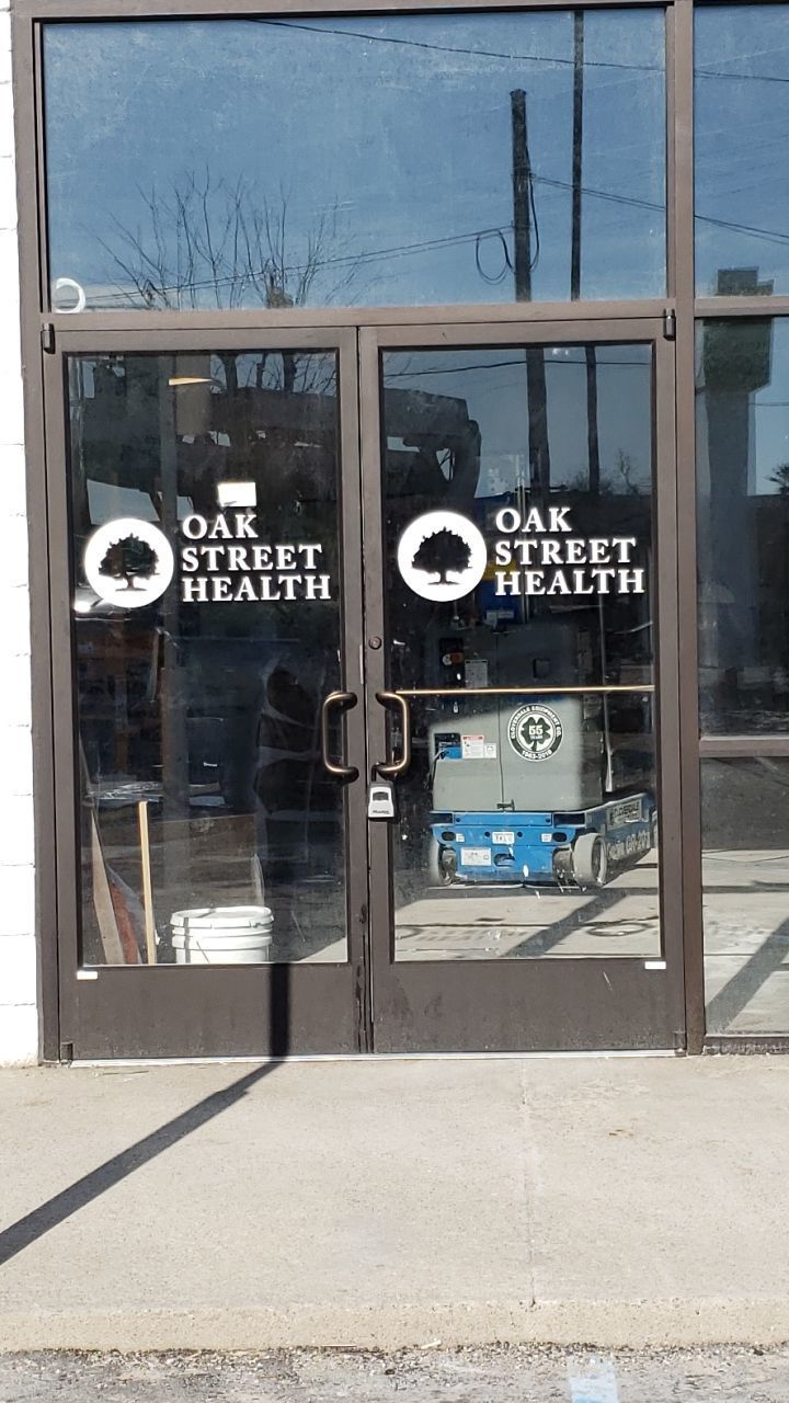 oakstreet health flint door vinyl logo white