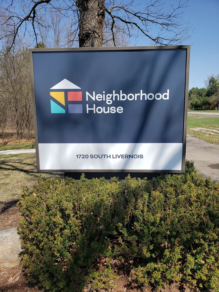 monument sign for neighborhood house with logo